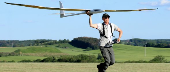 Model airplane pilot with model airplane